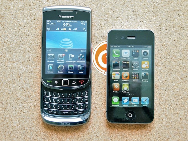 A BlackBerry Torch and an iPhone
