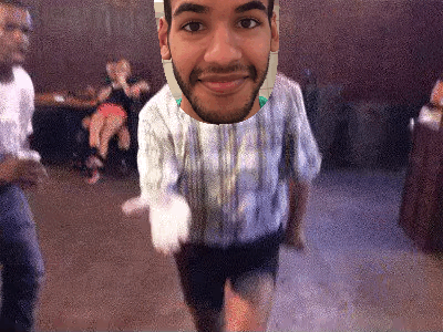 A GIF showing a man dancing in a club. My face has been superimposed over the man&#39;s head.