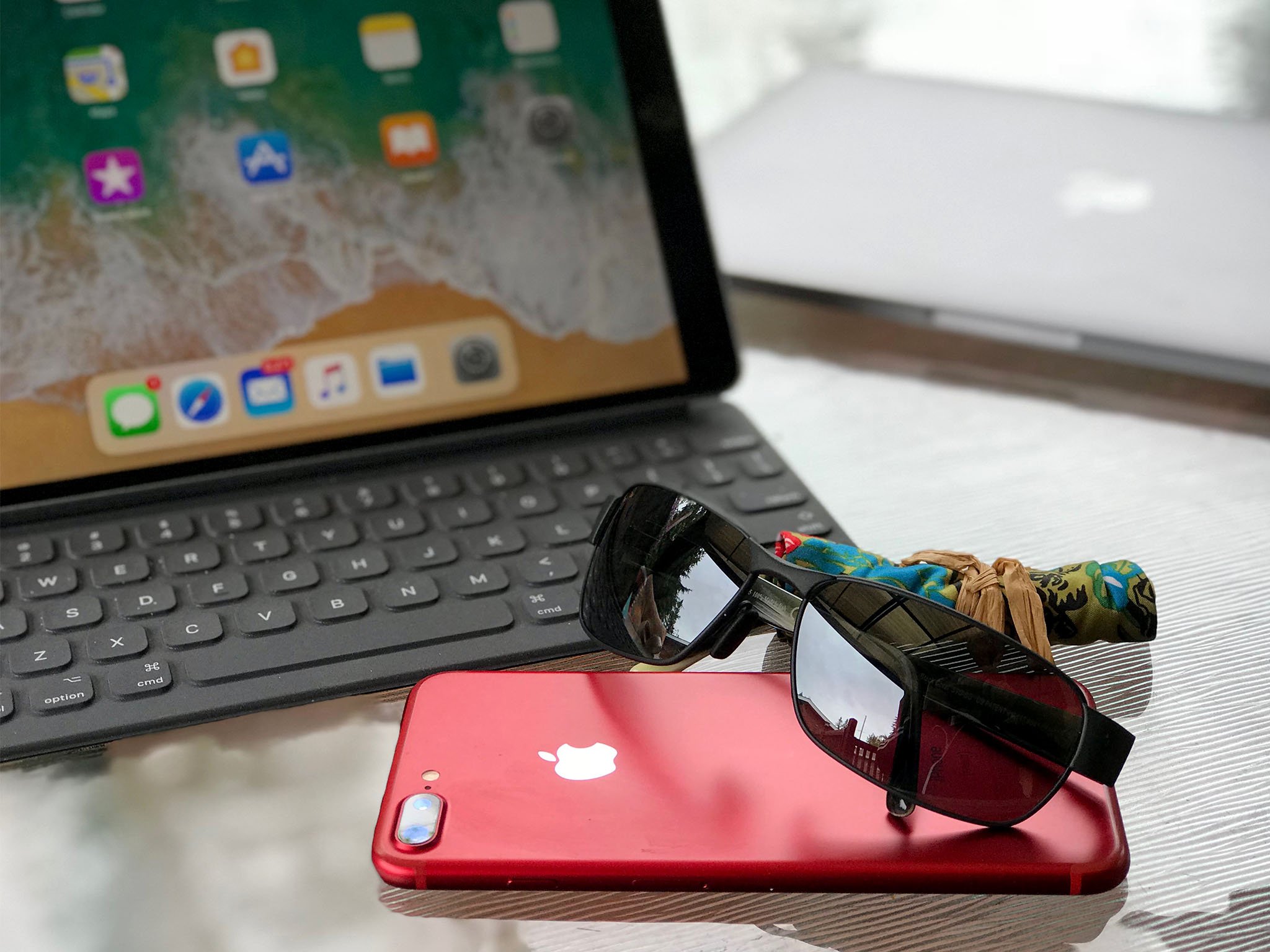 iPhone, iPad, and sunglasses