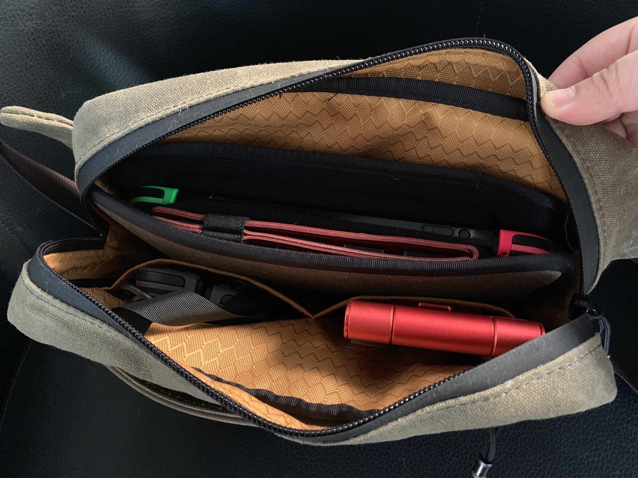 Waterfield Designs Sutter Sling Pouch for Nintendo Switch with the Switch Taco inside of bag