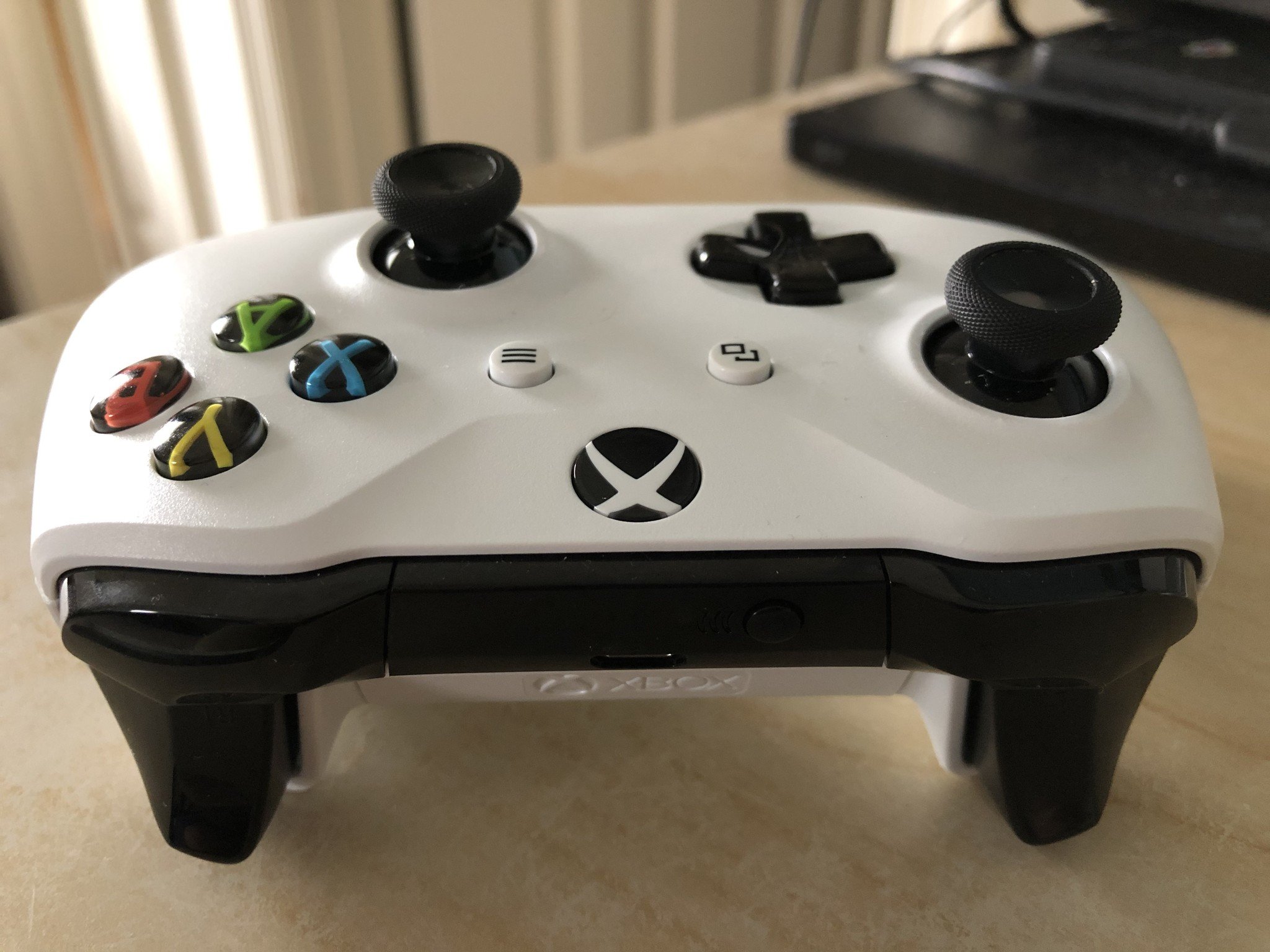 Xbox One controllers with Bluetooth capability will have black triggers and shoulder buttons, and white plastic around the round Xbox button on the face of the controller.