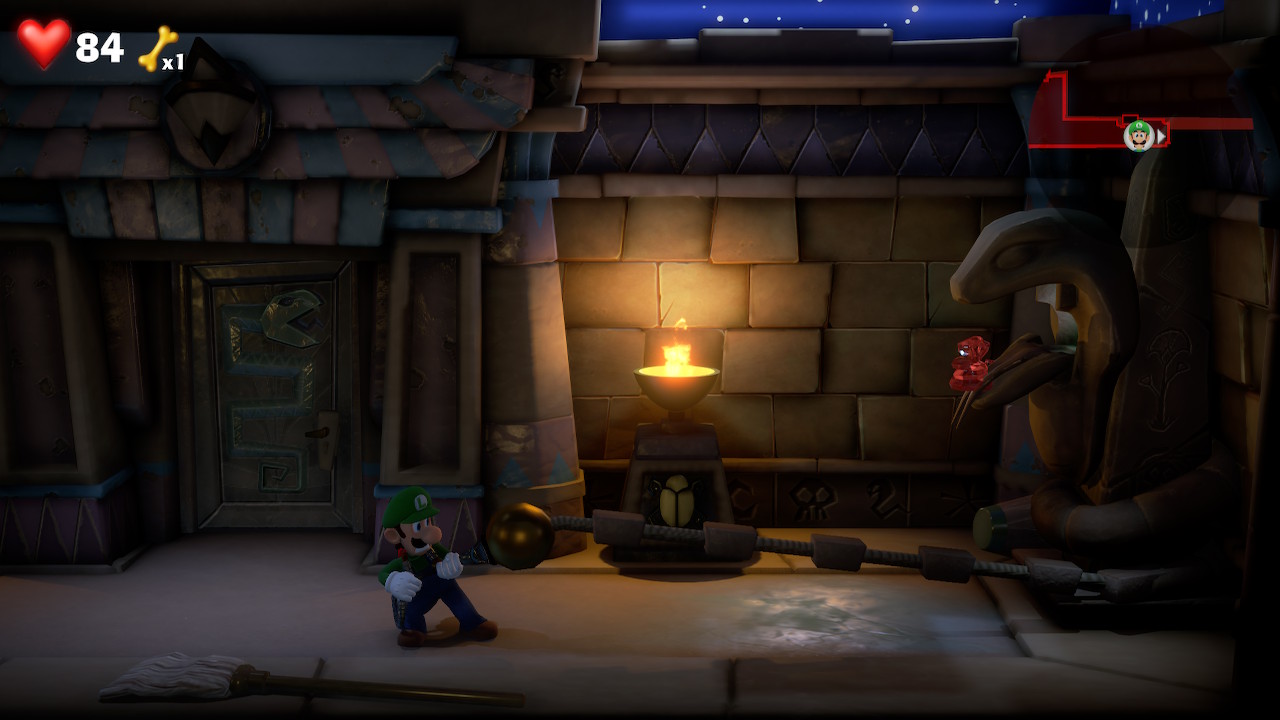 Luigi finds the red gem in Tomb Suites