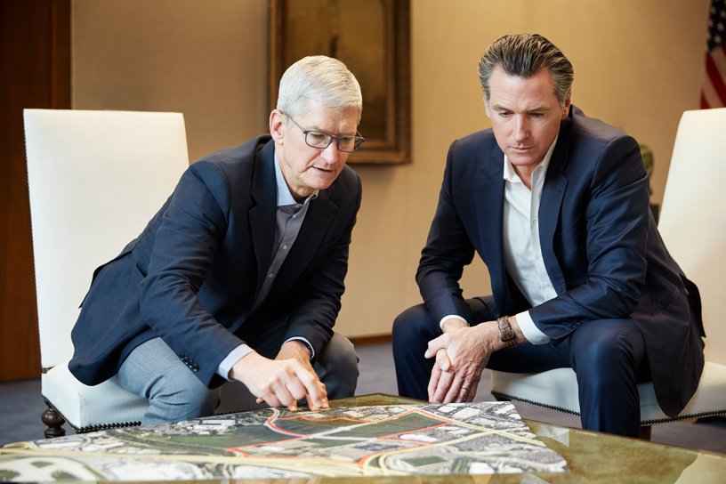 Tim Cook and Gavin Newsom looking at maps