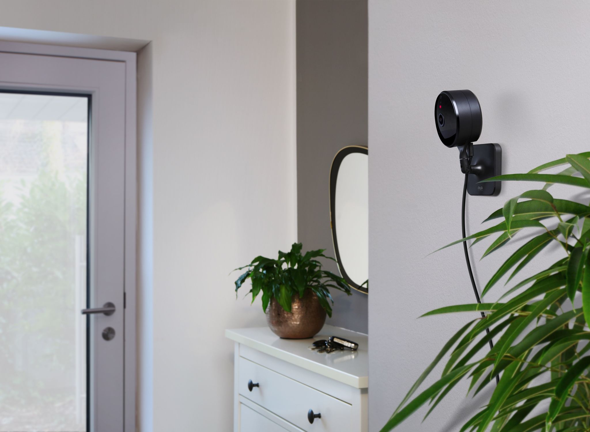 Eve Cam installed on a wall in an indoor setting
