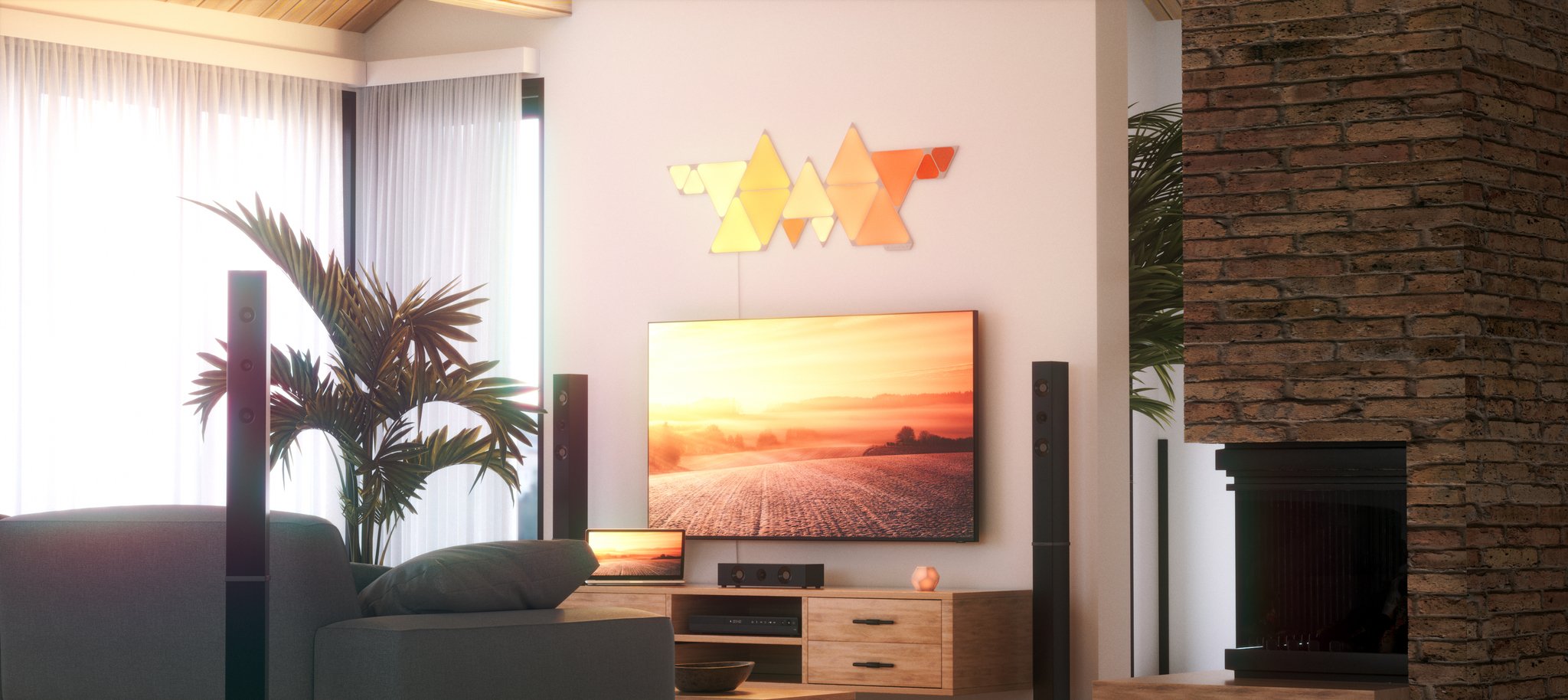 Nanoleaf Shapes Triangles Series above a television