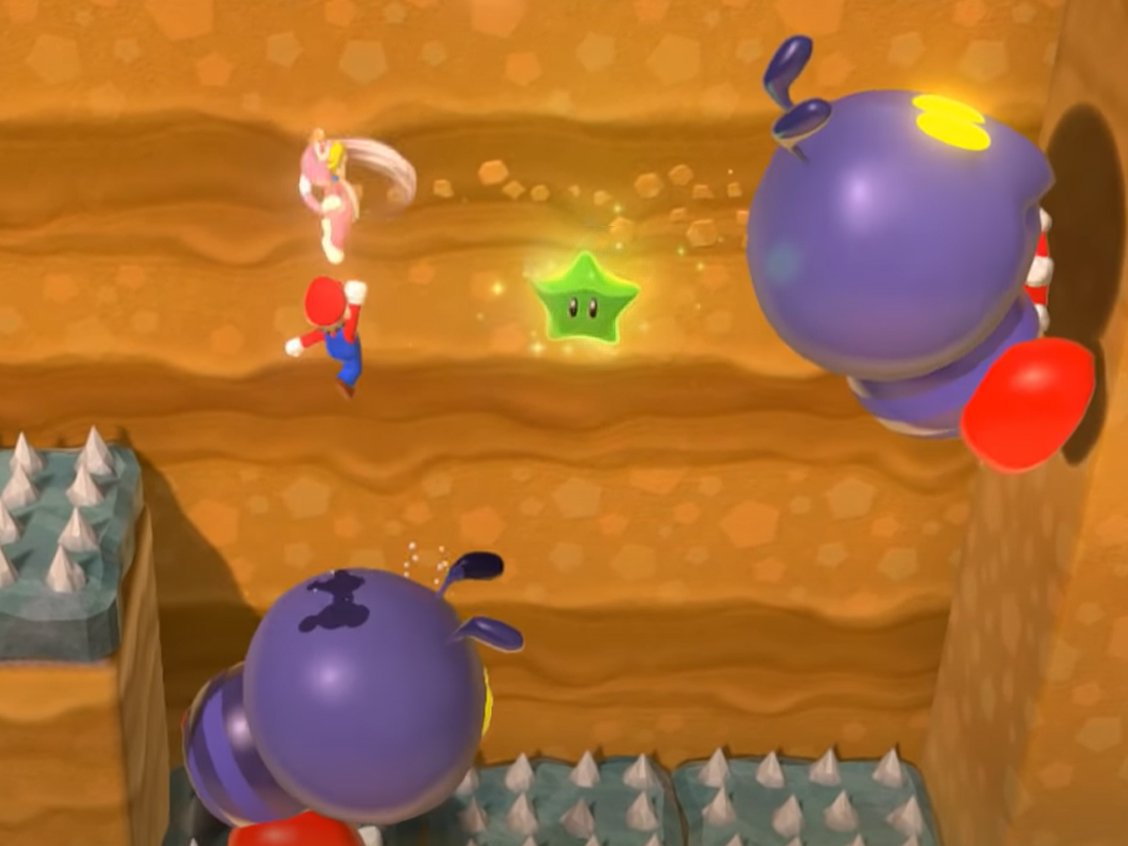 Super Mario 3D World Mario and Peach jumping on the back of a Big Ant Trooper