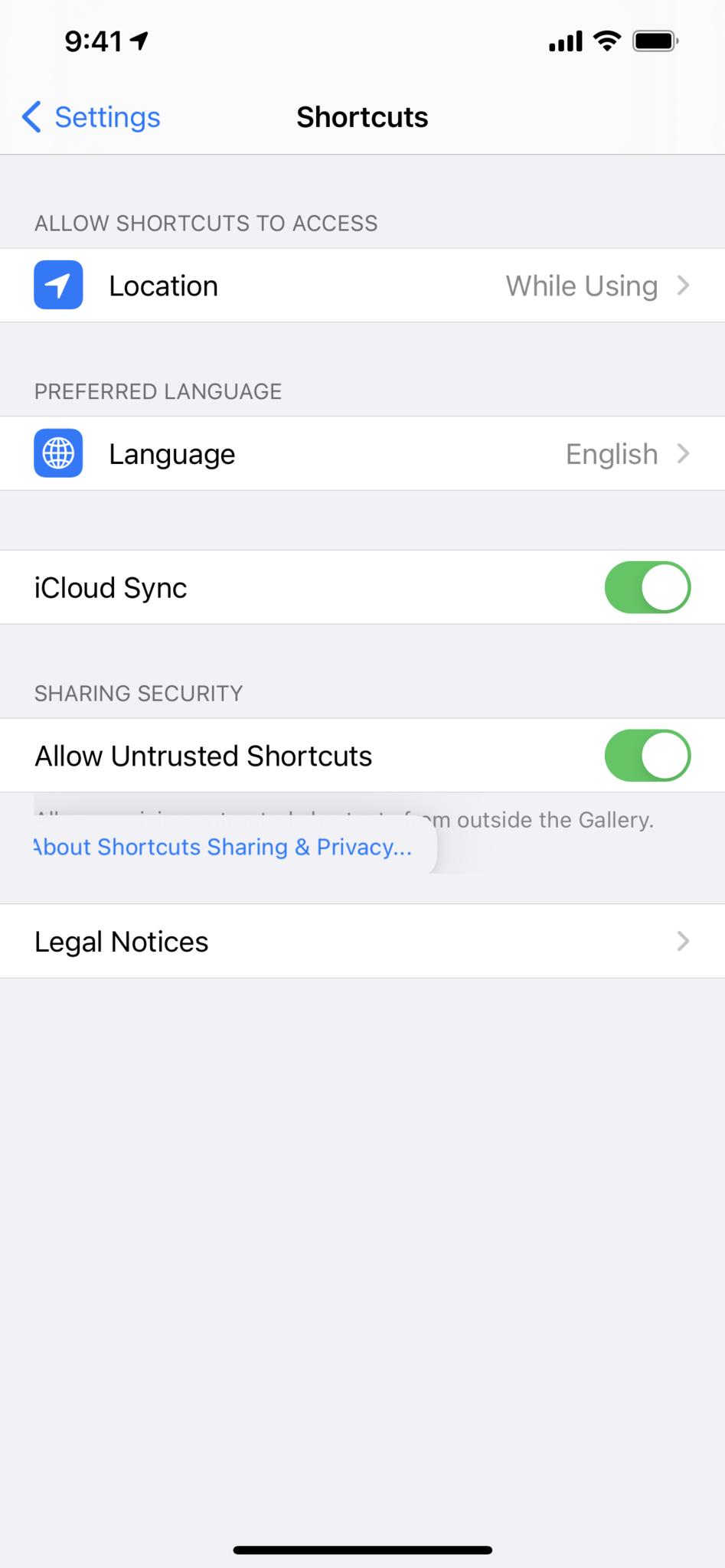 Screenshot showing Shortcuts settings with "About Shortcuts Sharing & Privacy" highlighted and expanding under a tap-and-hold gesture.