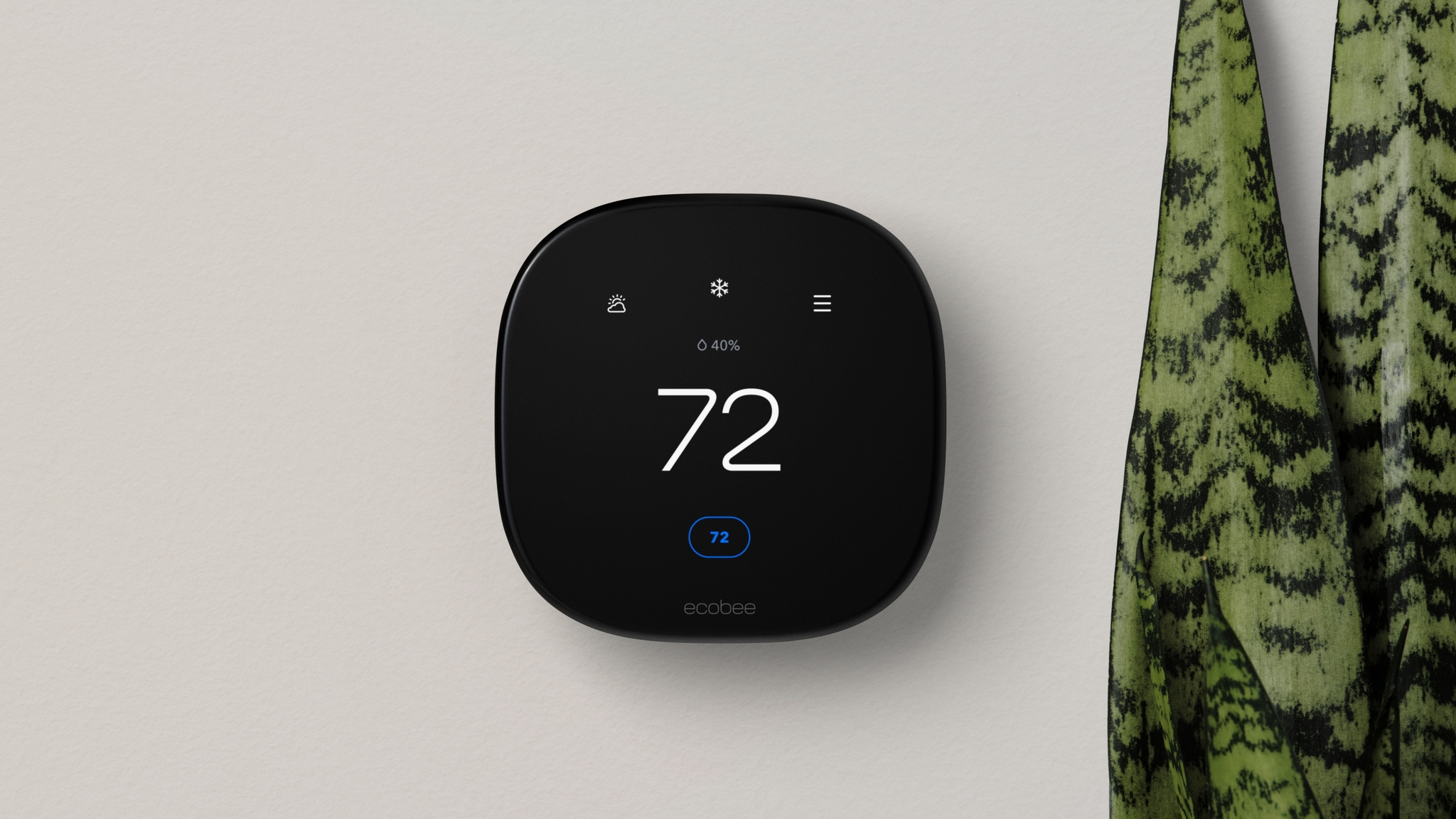 ecobee Smart Thermostat Enhanced installed on a wall
