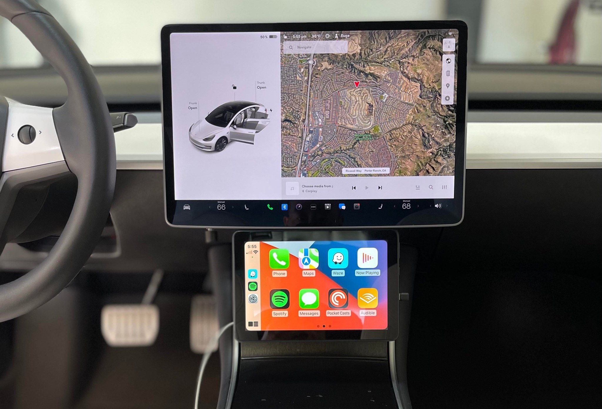 Android tablet running CarPlay in a Tesla