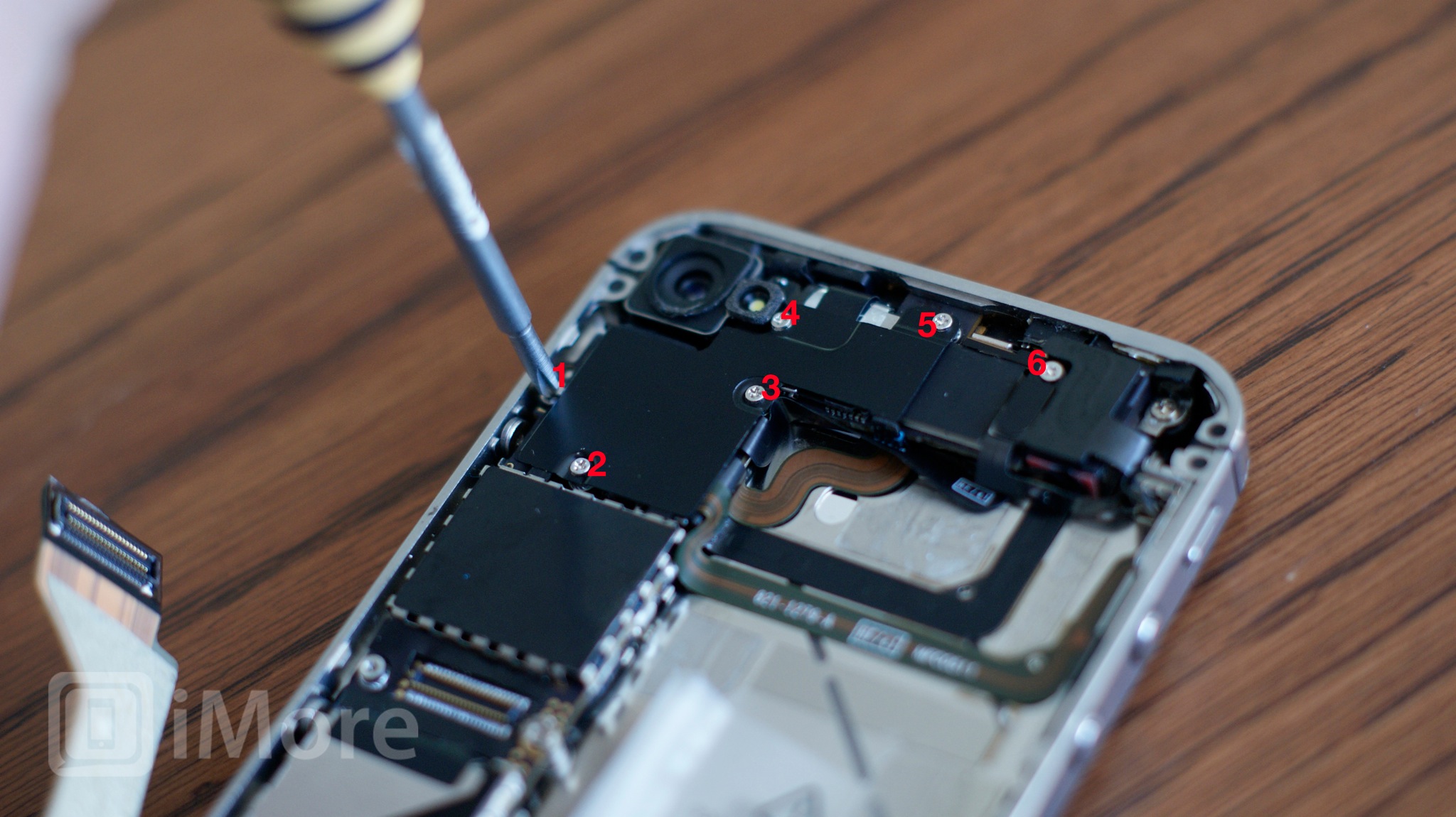 Remove logic board shield screws CDMA iPhone 4