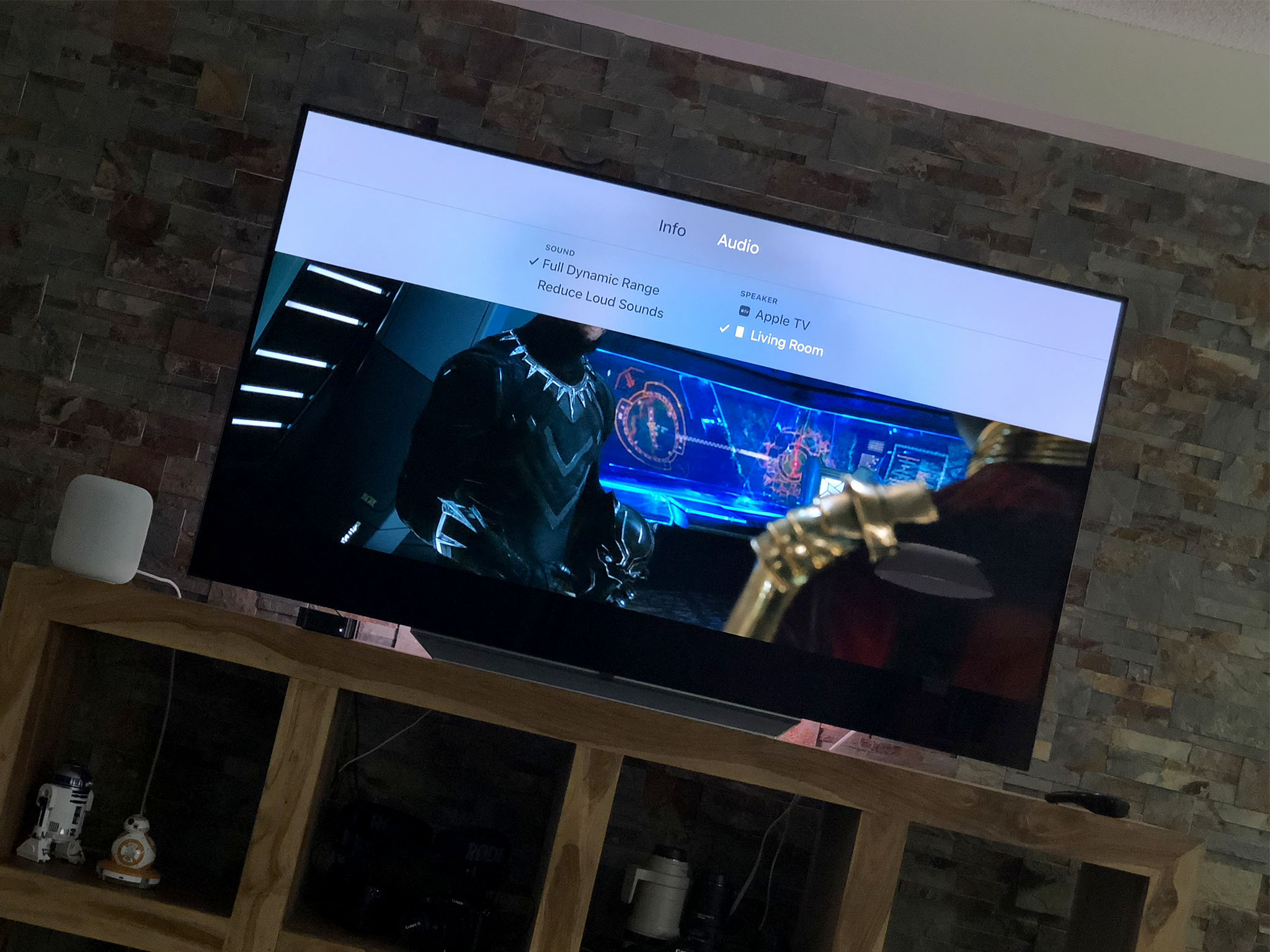 HomePod on a TV stand with 