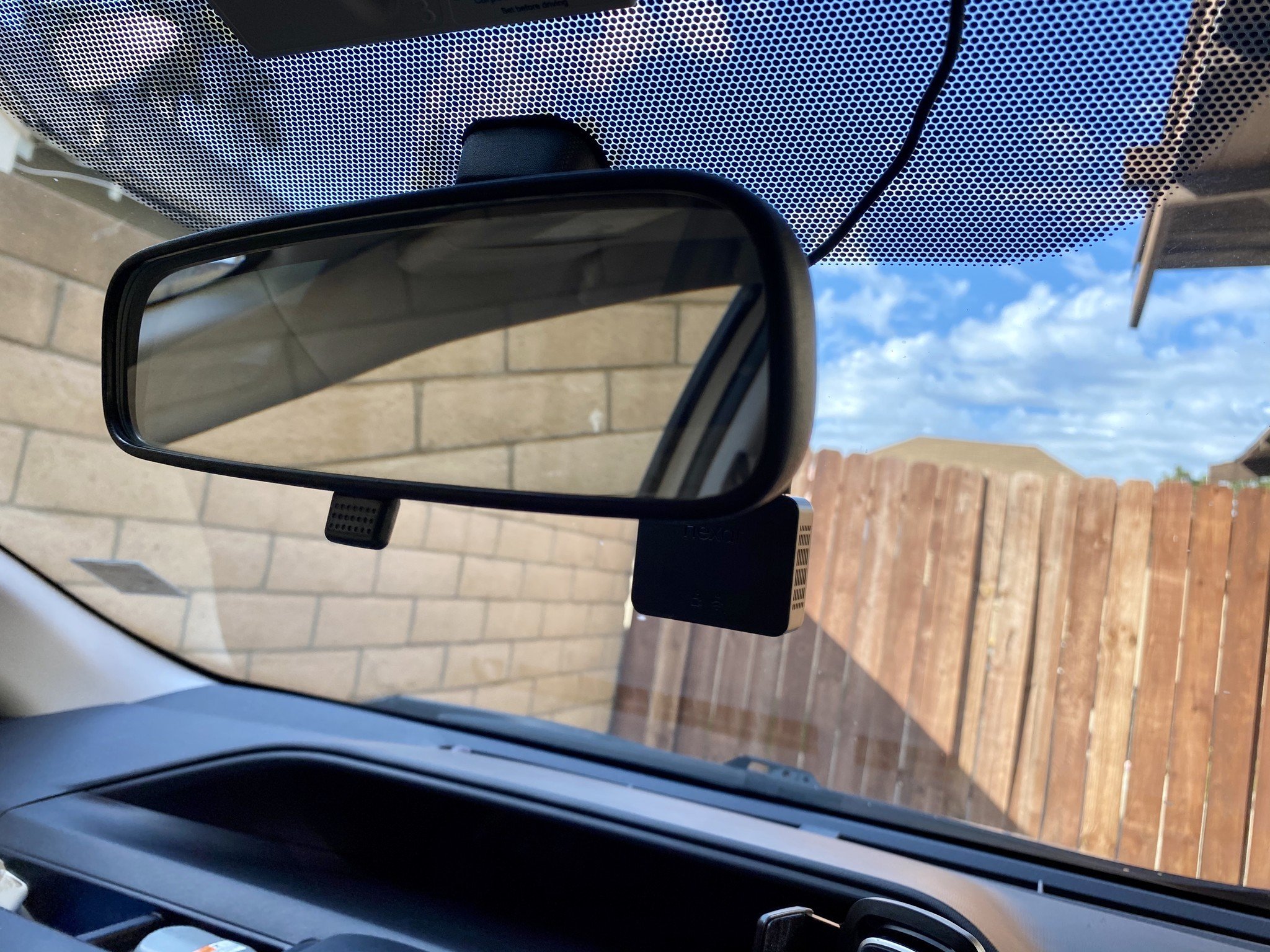 Nexar Beam Dash Cam Behind Rear View Mirror