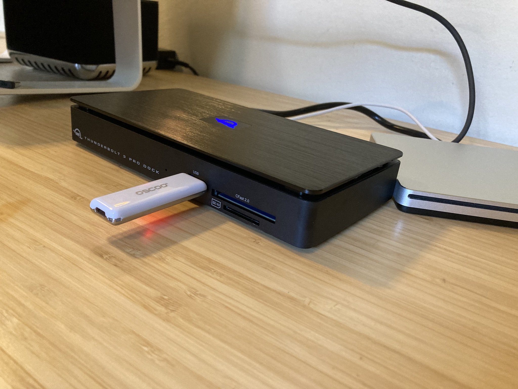 Owc Thunderbolt 3 Pro Dock with connected flash drive and DVD drive