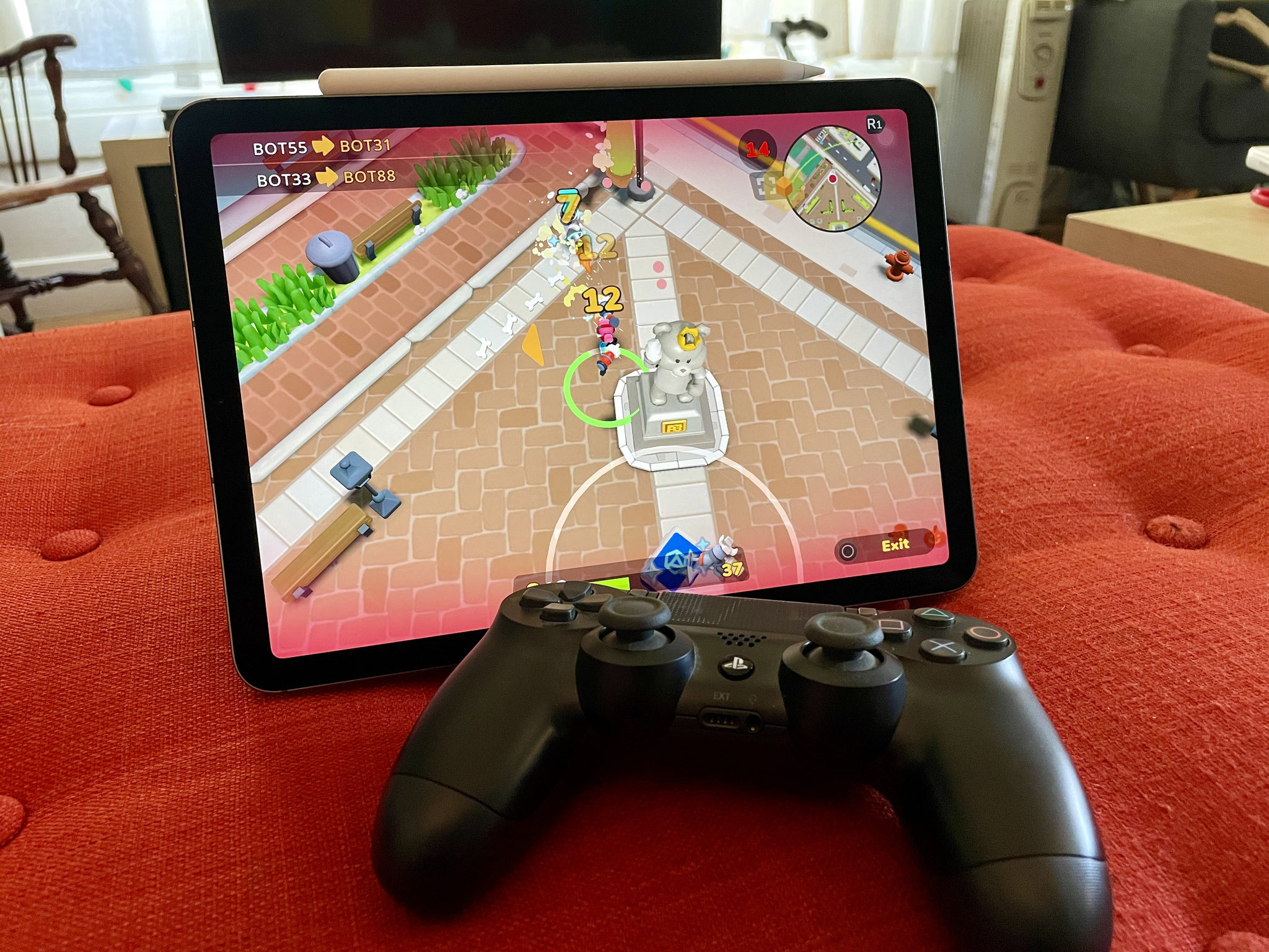 iPad Air 4 with DualShock Controller playing Butter Royale in Apple Arcade