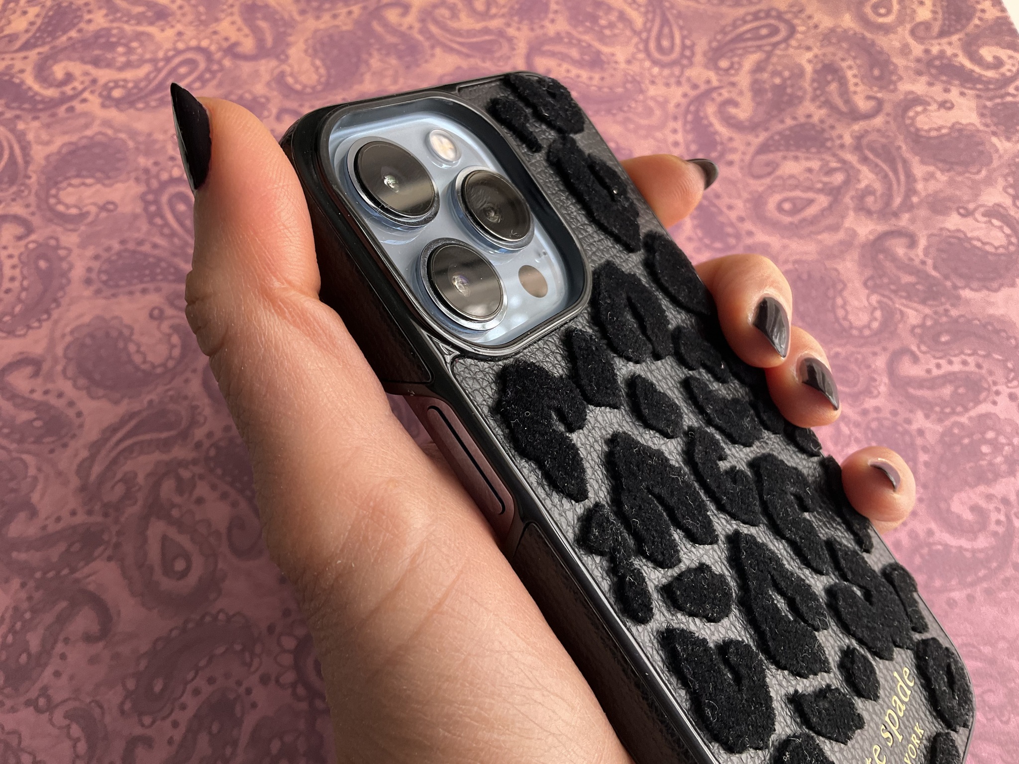 Kate Spade New York Wrap Case For Iphone Leopard Flocked Black Lifestyle In Hand Close Up