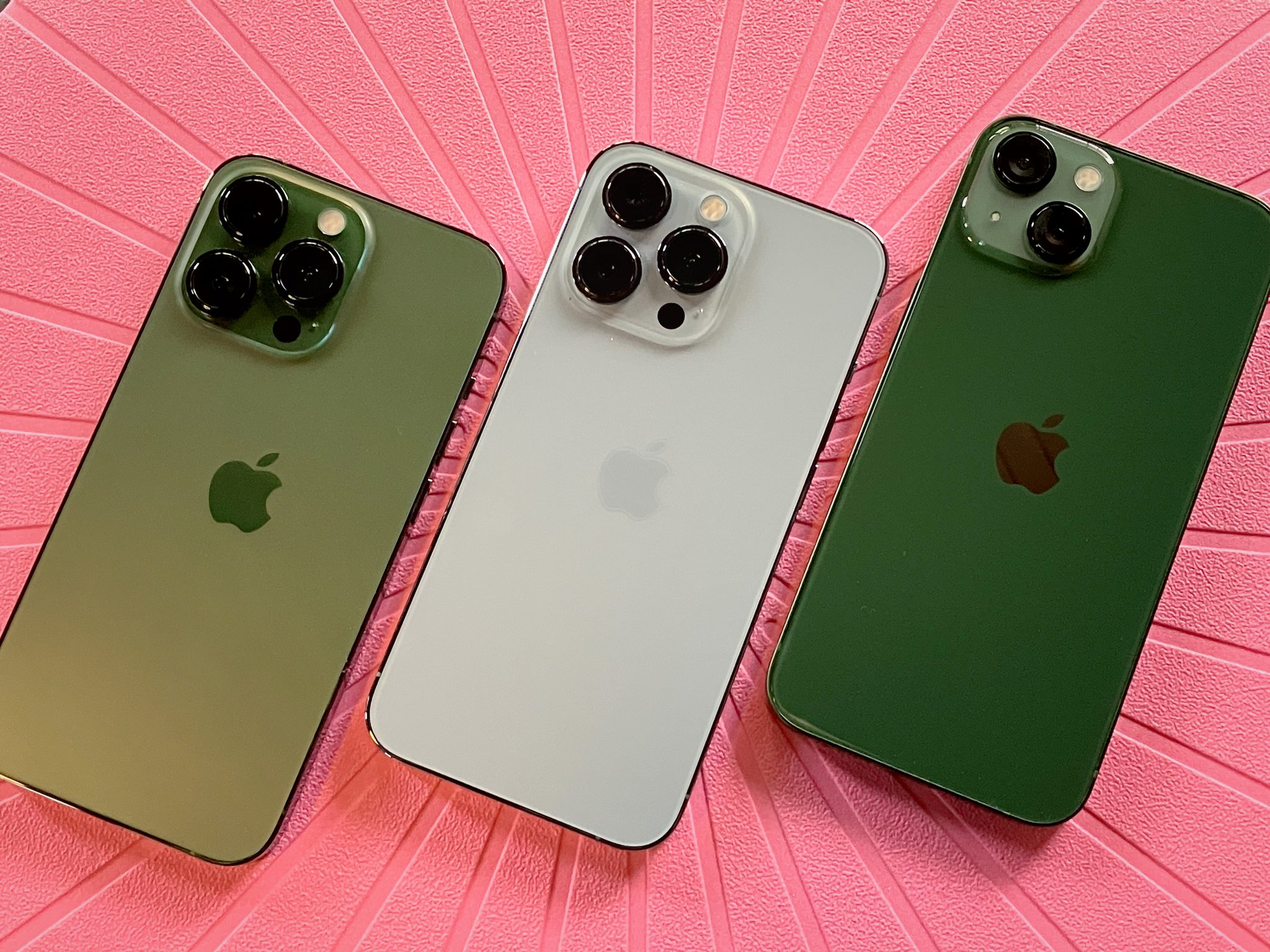 Green iPhone 13 and Alpine Green iPhone 13 Pro compared with Sierra Blue