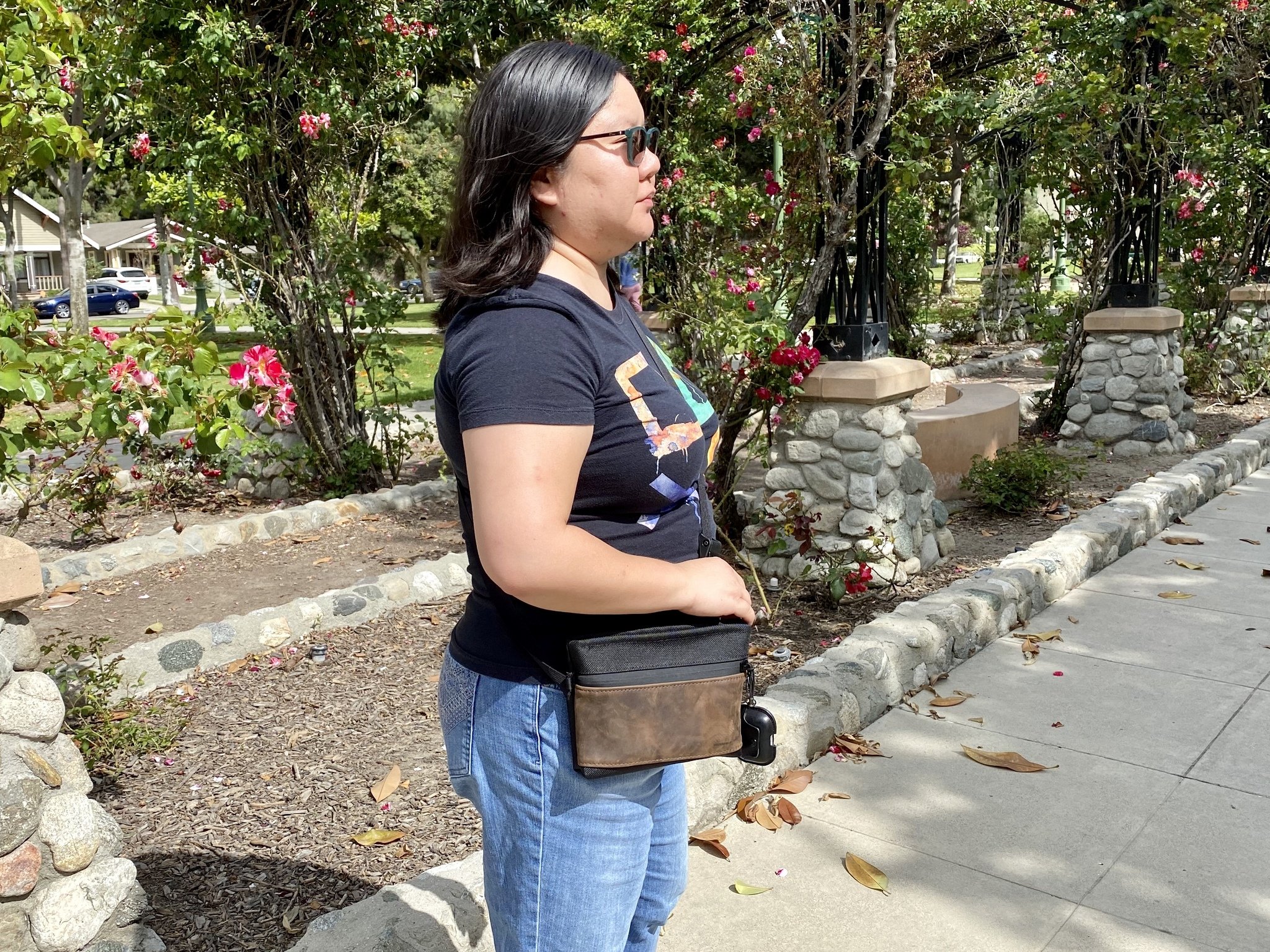 Christine Romero-Chan wearing the Waterfield Designs Marquis Crossbody Pouch