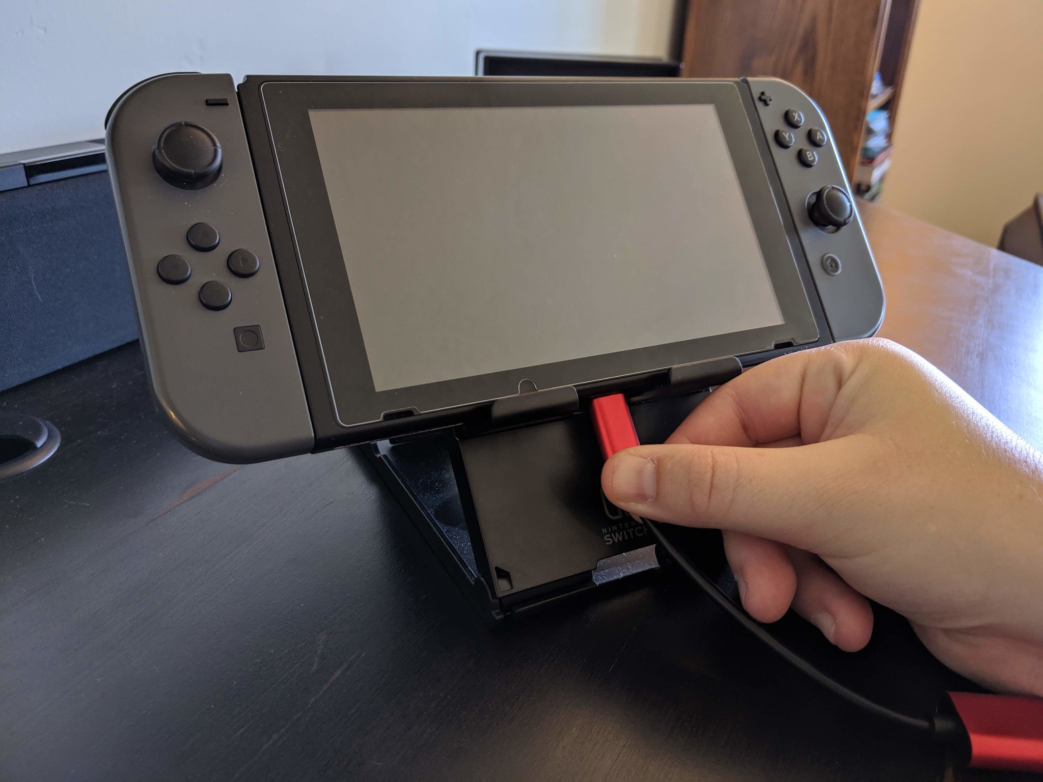 How to connect your Xbox One controller with the Nintendo Switch in wireless tabletop mode step one: Insert the USB-C cable that comes with the Magic-NS Adapter into the Nintendo Switch