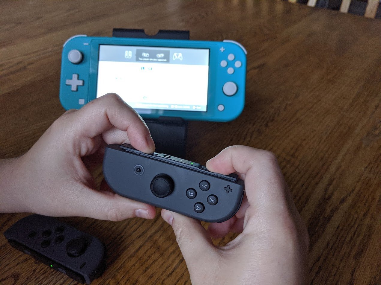 How to pair Joy-Cons Nintendo Switch Lite: For each person to have half of a Joy-Con, click the SL and SR buttons on each controller