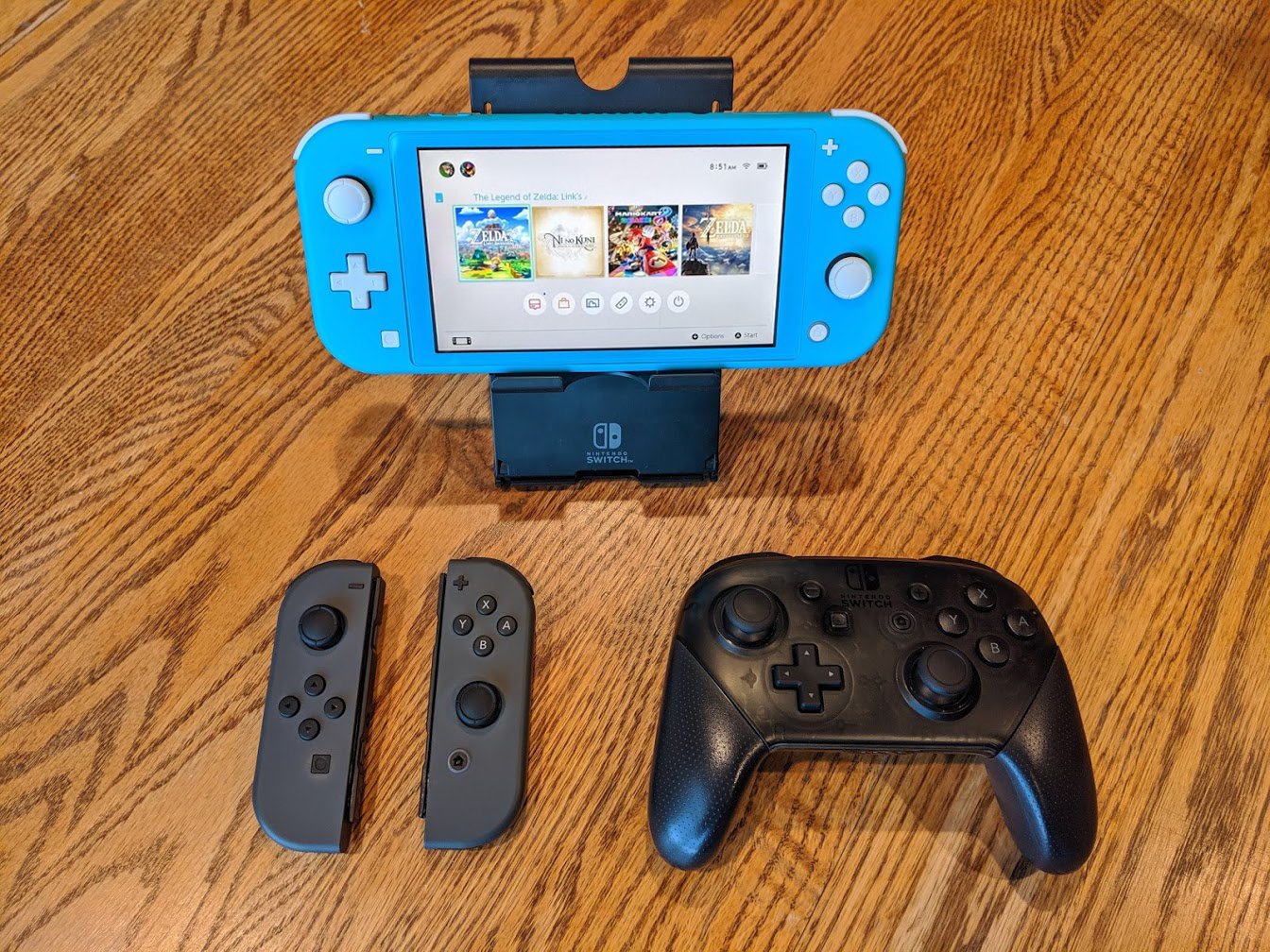Nintendo Switch Lite with external Joy-Cons and a Pro Controller