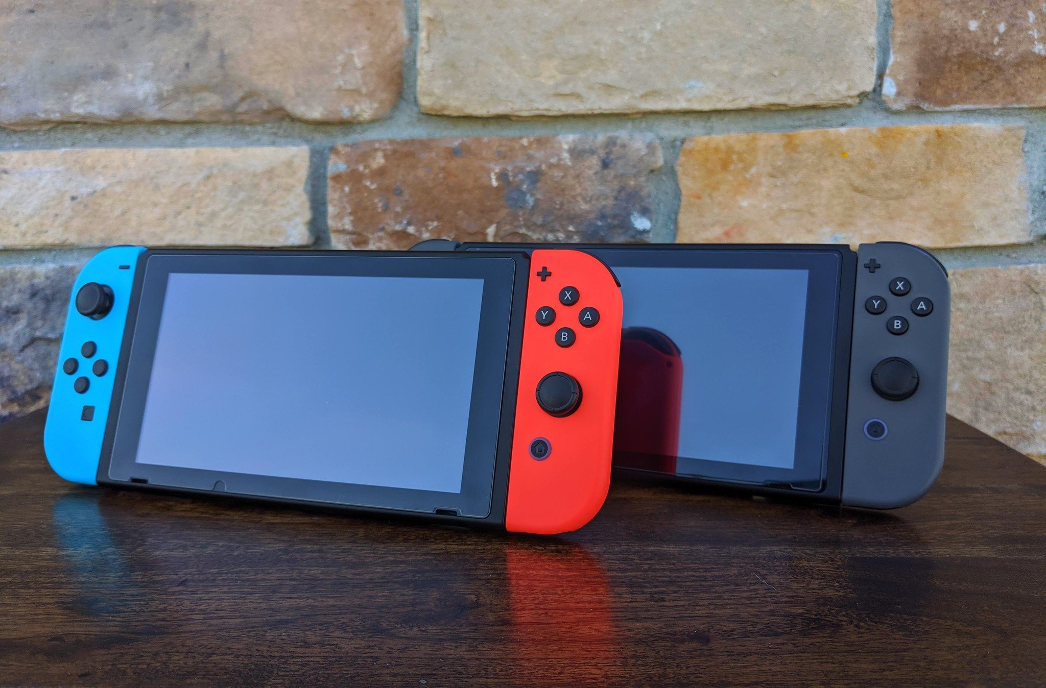 Two Nintendo Switch consoles