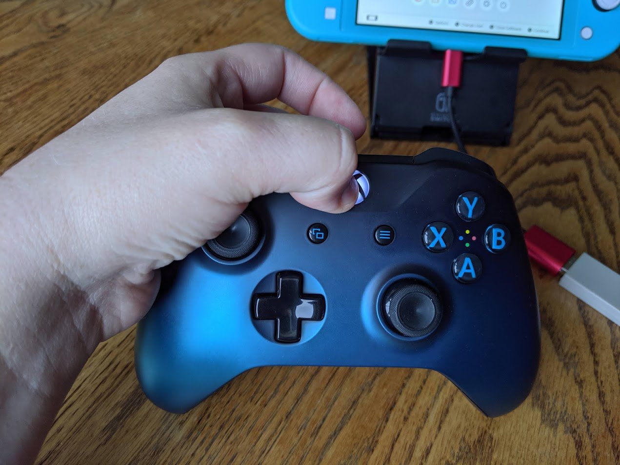 Hold down Home Button on Xbox One controller