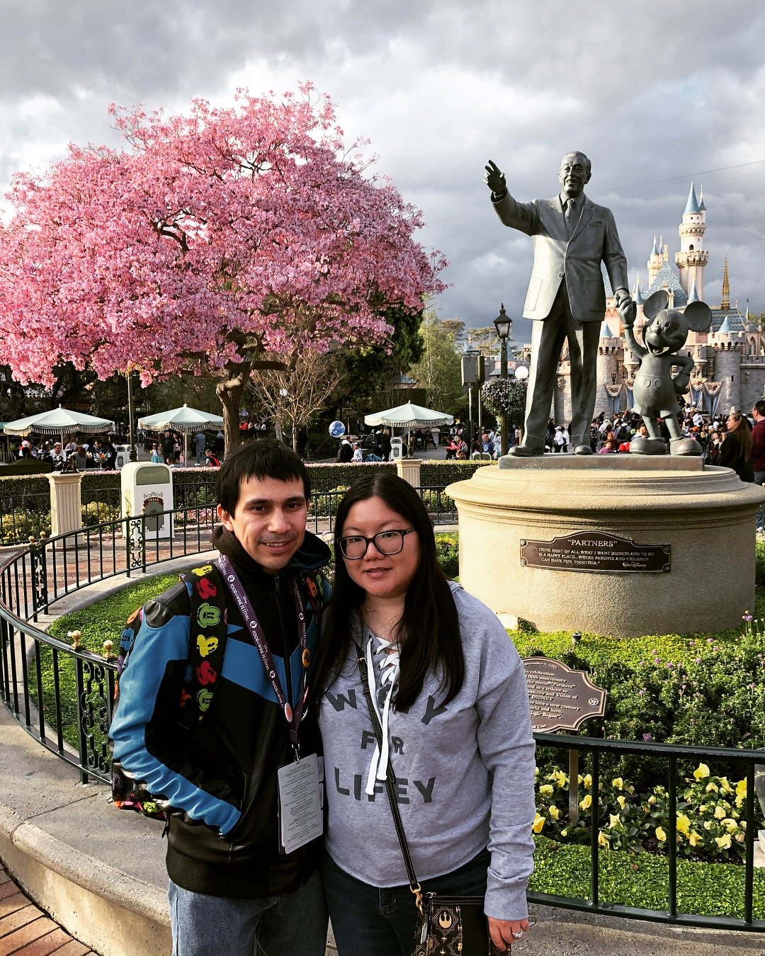 Robert and Christine with cherry blossoms Disneyland hub