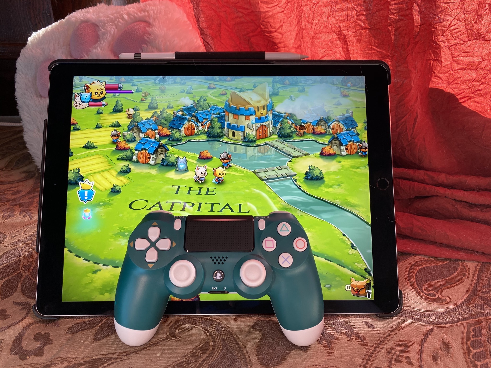 Alpine Green DualShock 4 with Cat Quest II on iPad Pro 12.9-inch