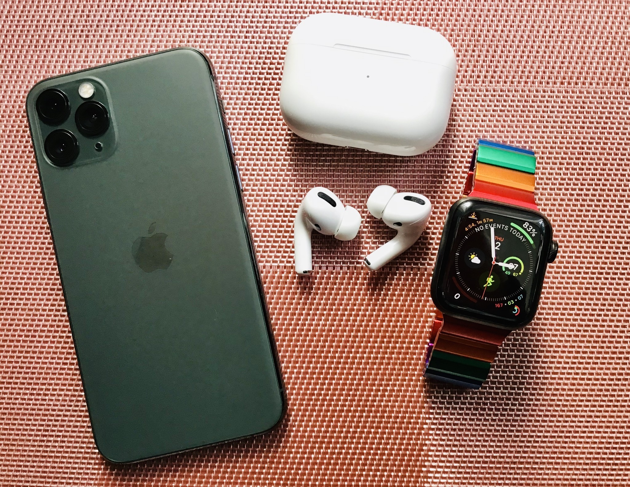 Midnight Green iPhone 11 Pro, AirPods Pro, and Apple Watch Series 5 Edition Space Black Titanium with JUUK Rainbow Ligero Band