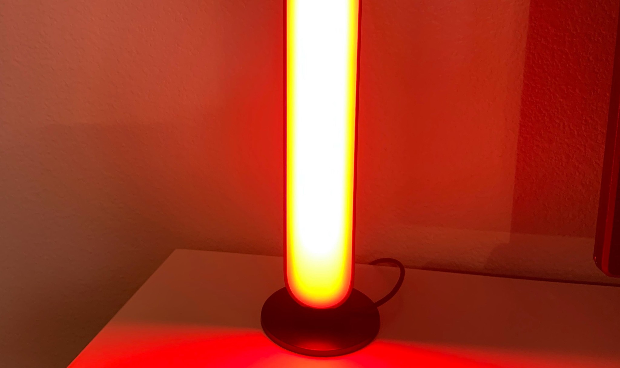 Philips Hue Play Bar illuminated with red color