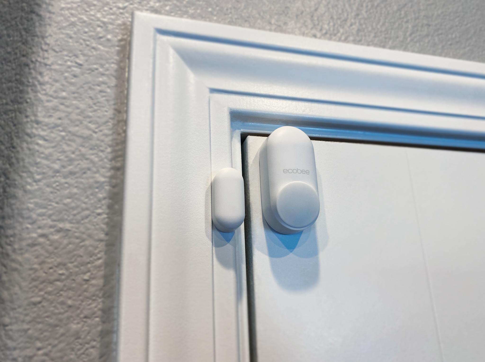 ecobee Smart Sensor for doors and windows installed on an interior door