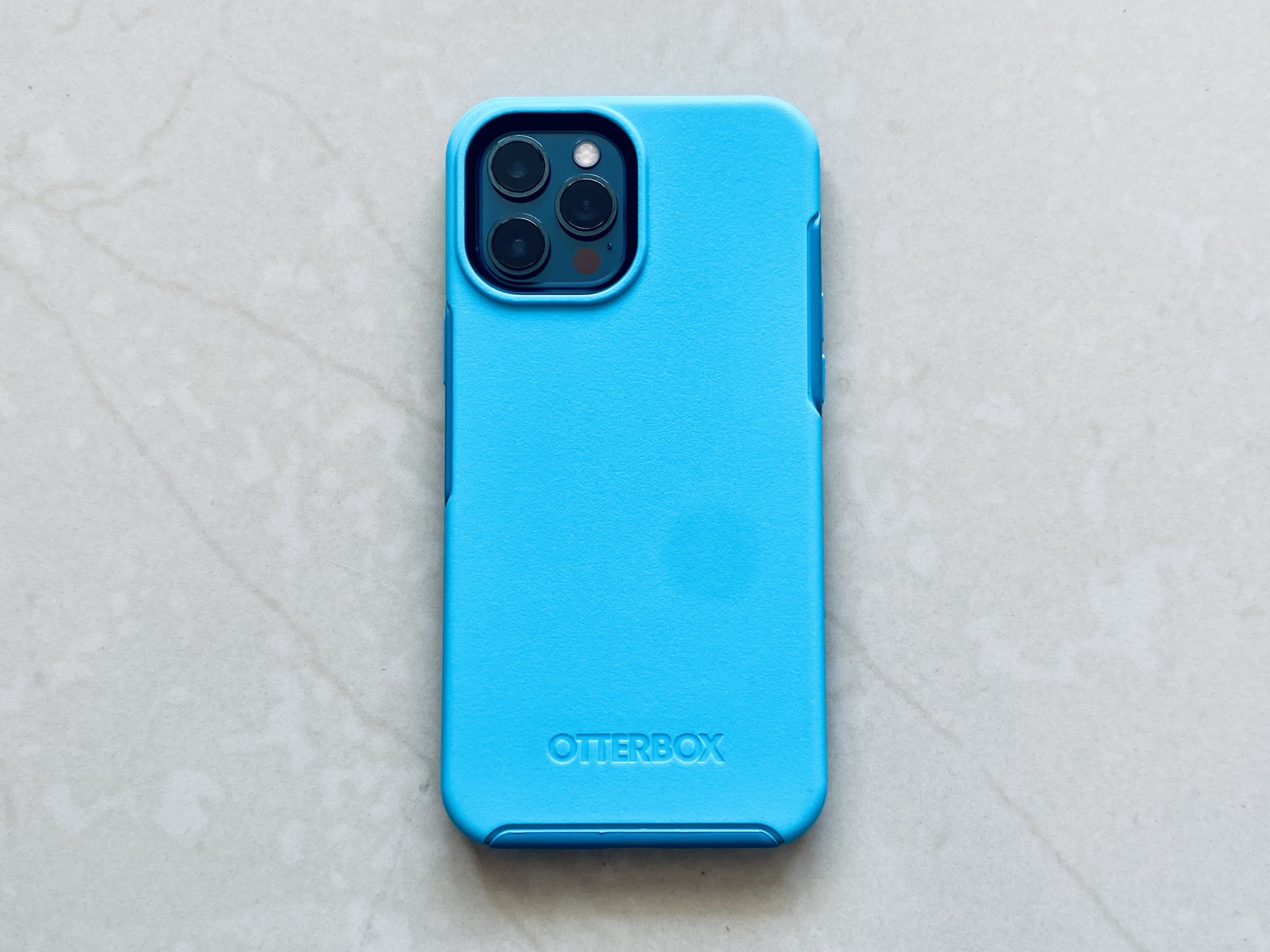Blue Sleek Drop Proof Protective Case OtterBox for Apple iPhone 12/iPhone 12 Pro Symmetry Series