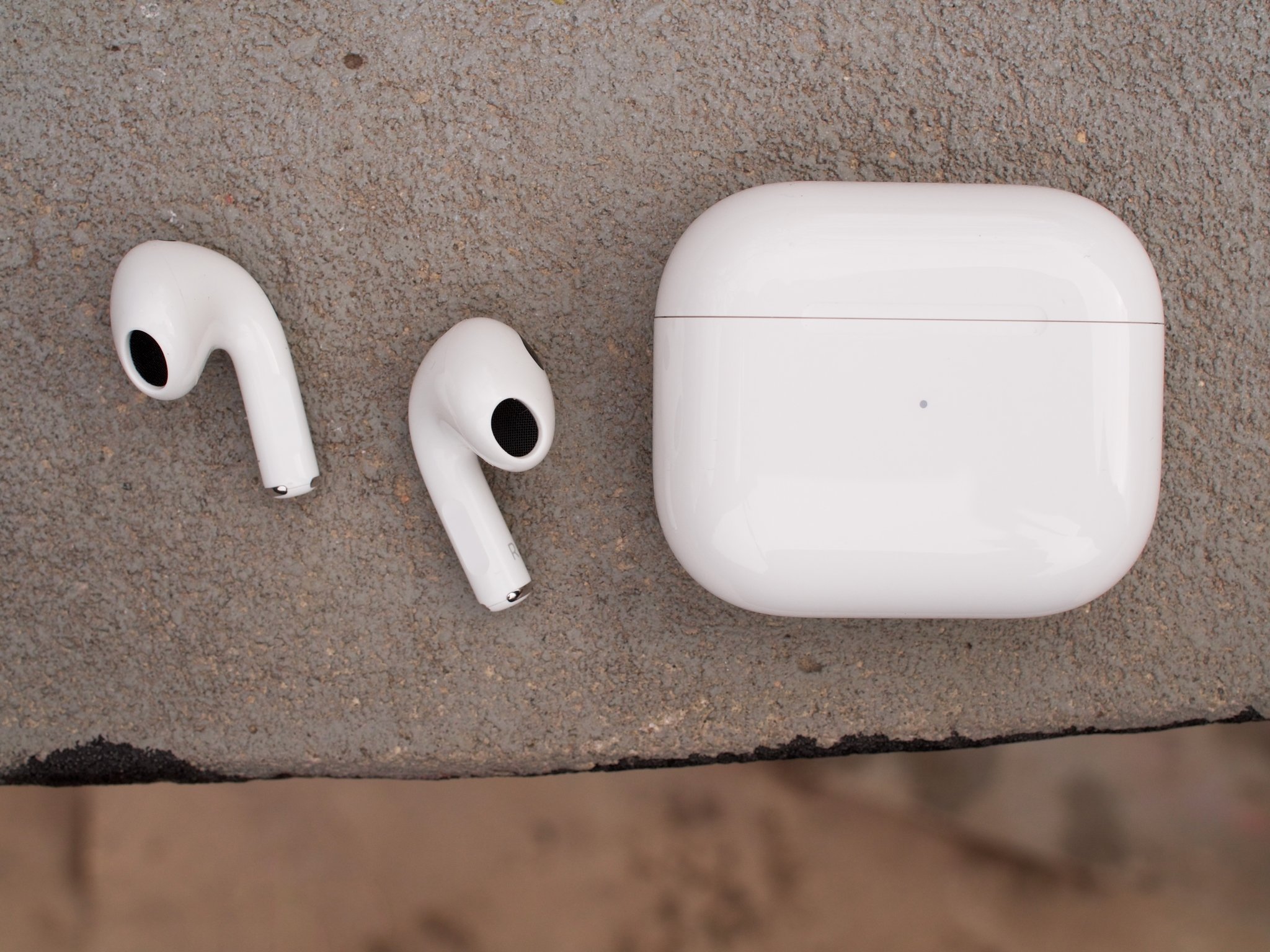 Airpods 3 Earbuds Beside Case