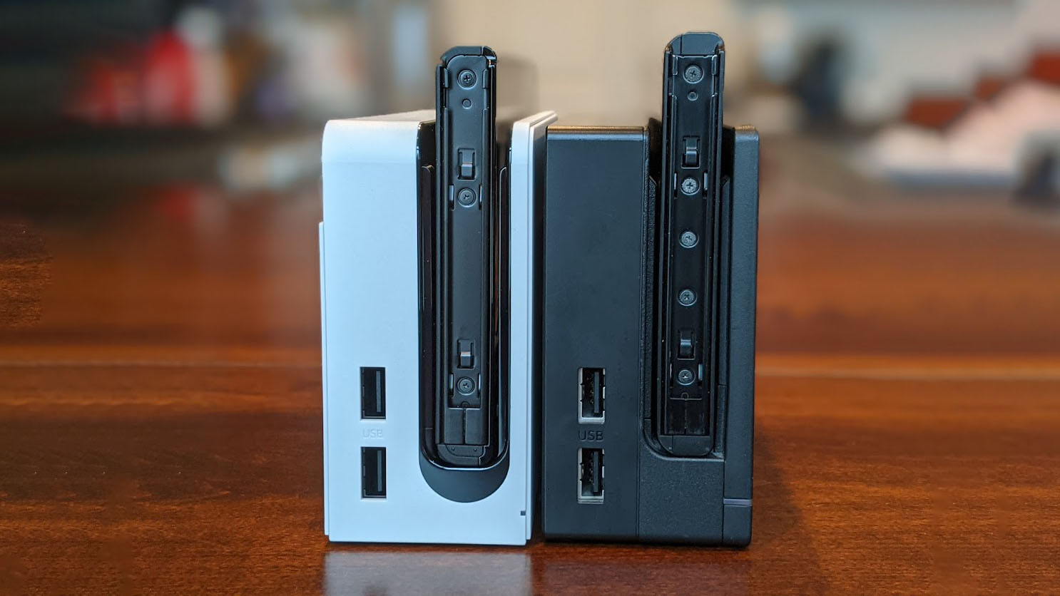 Nintendo Switch Oled Model And V2 Docks Next To Eachother