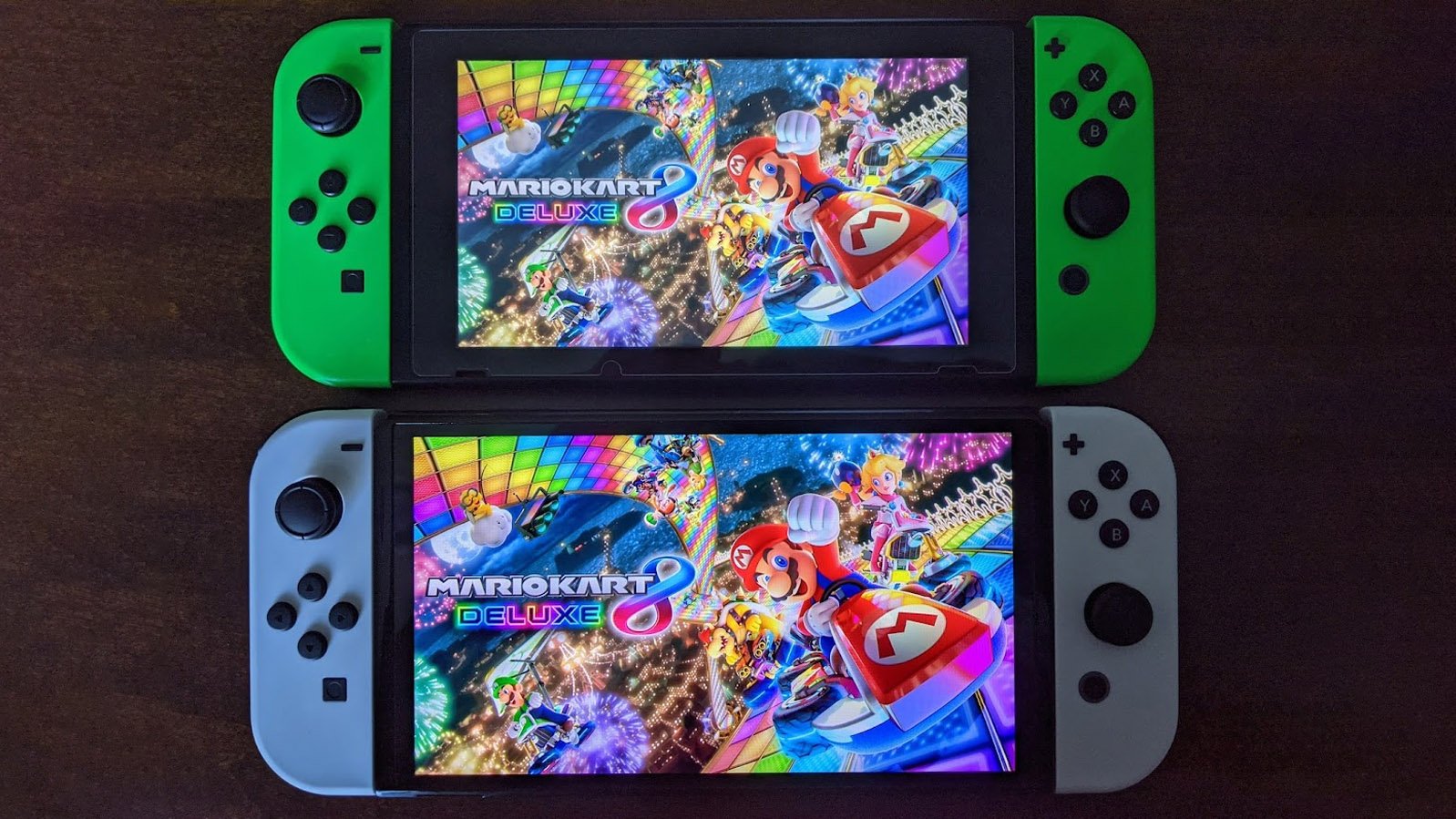 Nintendo Switch Oled Model Next To Switch V2 Mario Kart