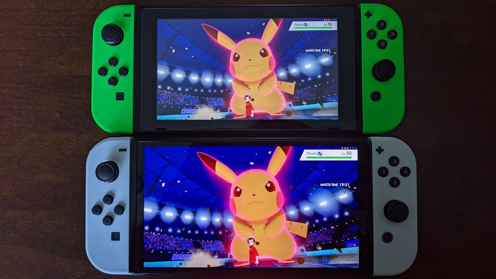Nintendo Switch Oled Model Next To Switch V2 Pokemon Sword