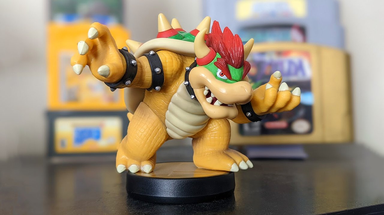 Bowser Amiibo Video Game Cartridges In Background