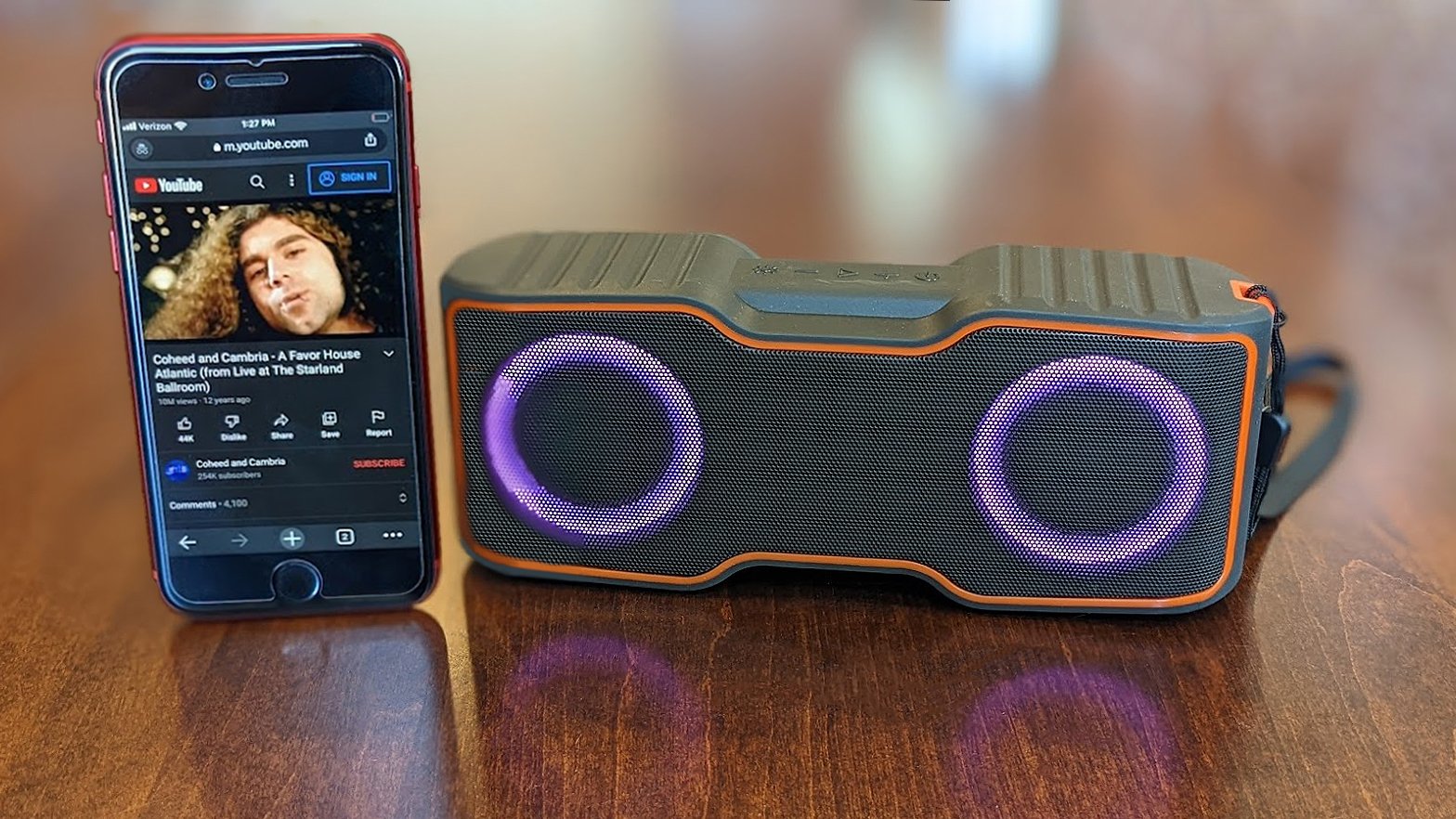 Easysmx Vkf2pro Portable Bluetooth Speaker Next To Iphone Se Playing Youtube