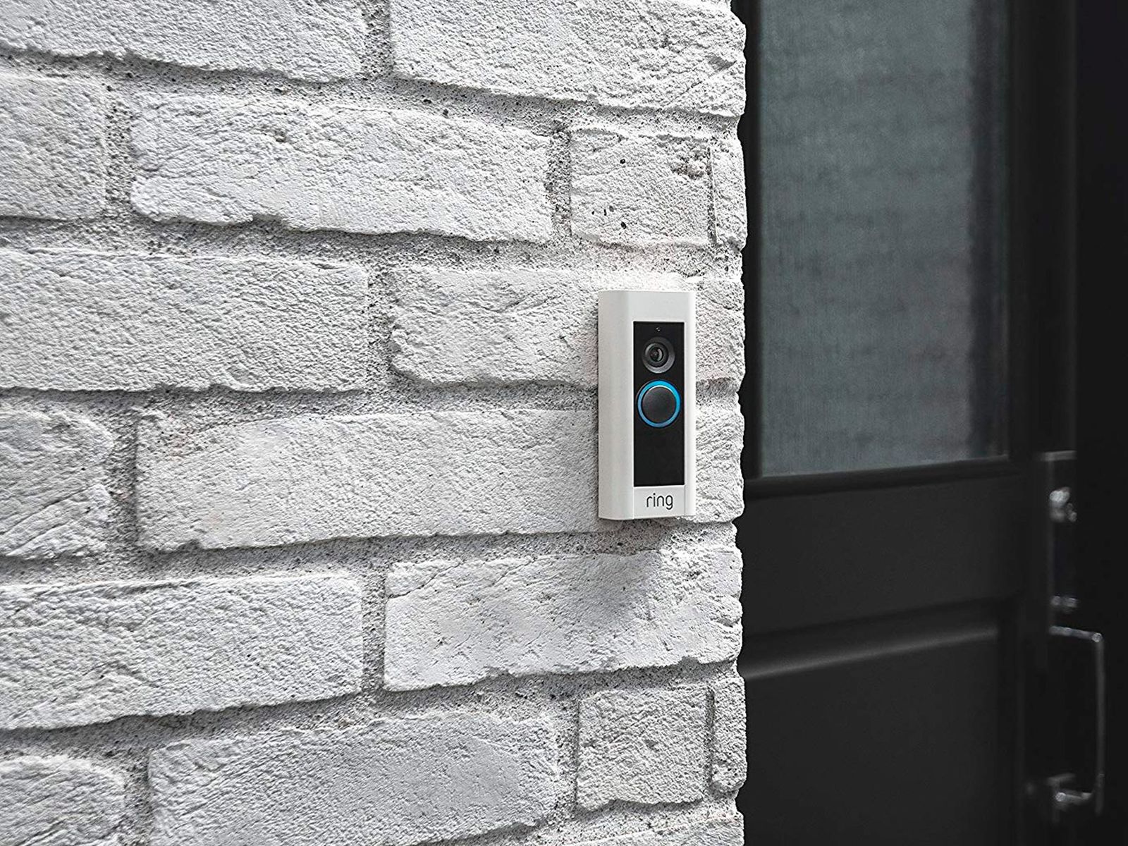Ring Pro Video Doorbell installed outdoors on a brick wall