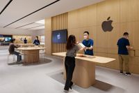 Apple store workers get surprise pay rise as union pressure grows