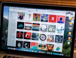 How to quickly add multiple songs to a playlist in iTunes