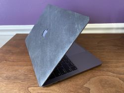 Give your MacBook a unique style with a real wood or stone Cover-Up Skin