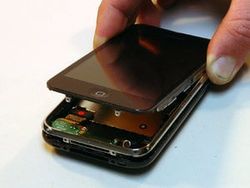 iFixit.com iBreaks it Wide Open! iPhone 3G Tear Down Live!
