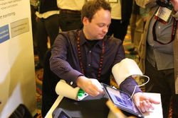 Withings demonstrates iPhone interface for scale, blood pressure readings, baby monitor - TiPb at CES 2011