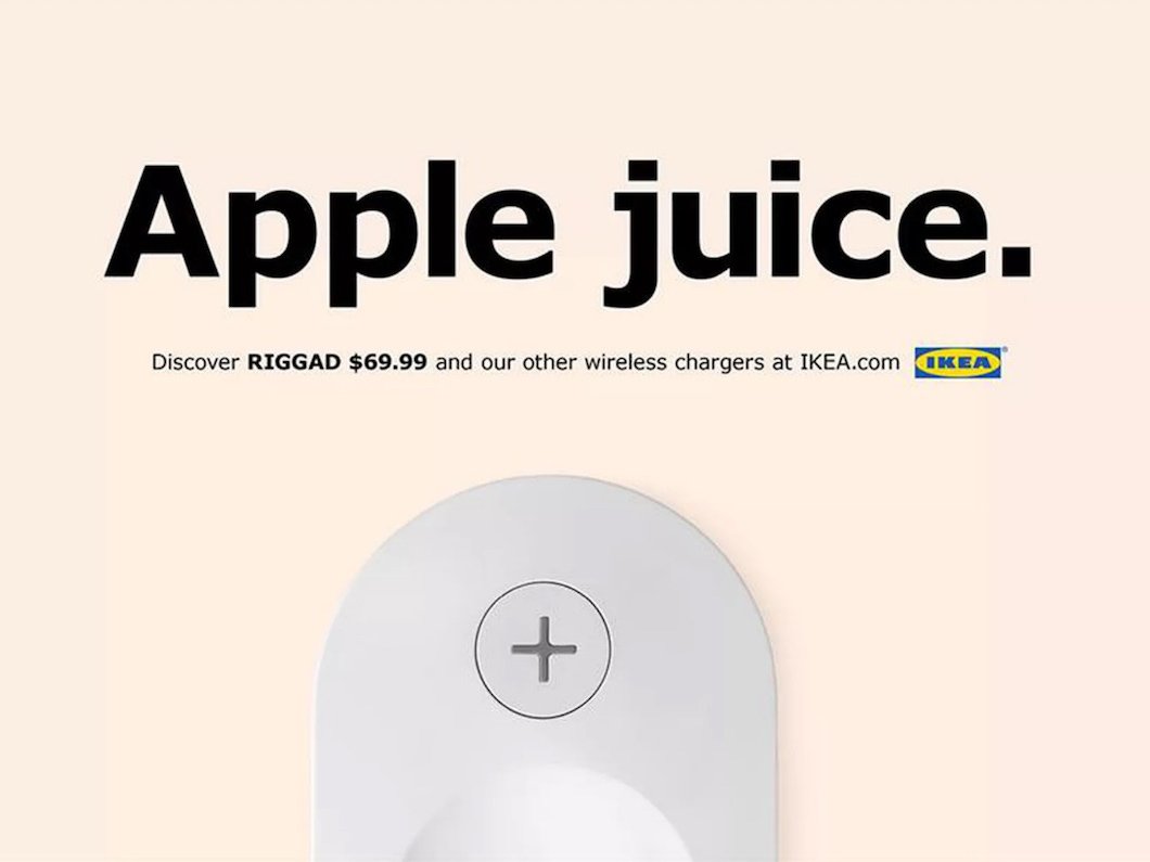an IKEA ad showing a Qi wireless charging lap base with text that reads 'Apple juice.'