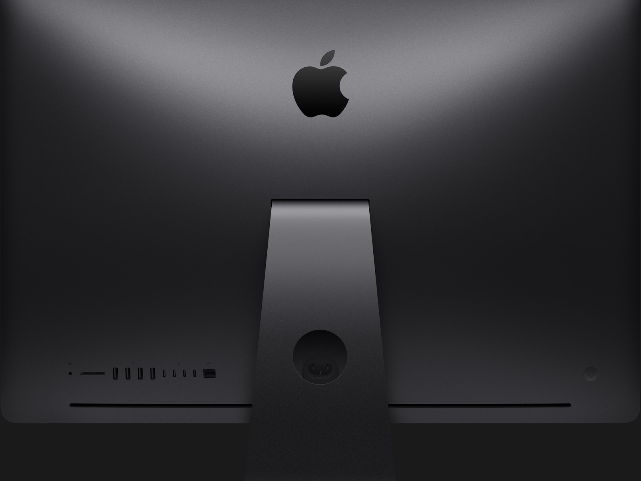 A back view of the space gray iMac Pro
