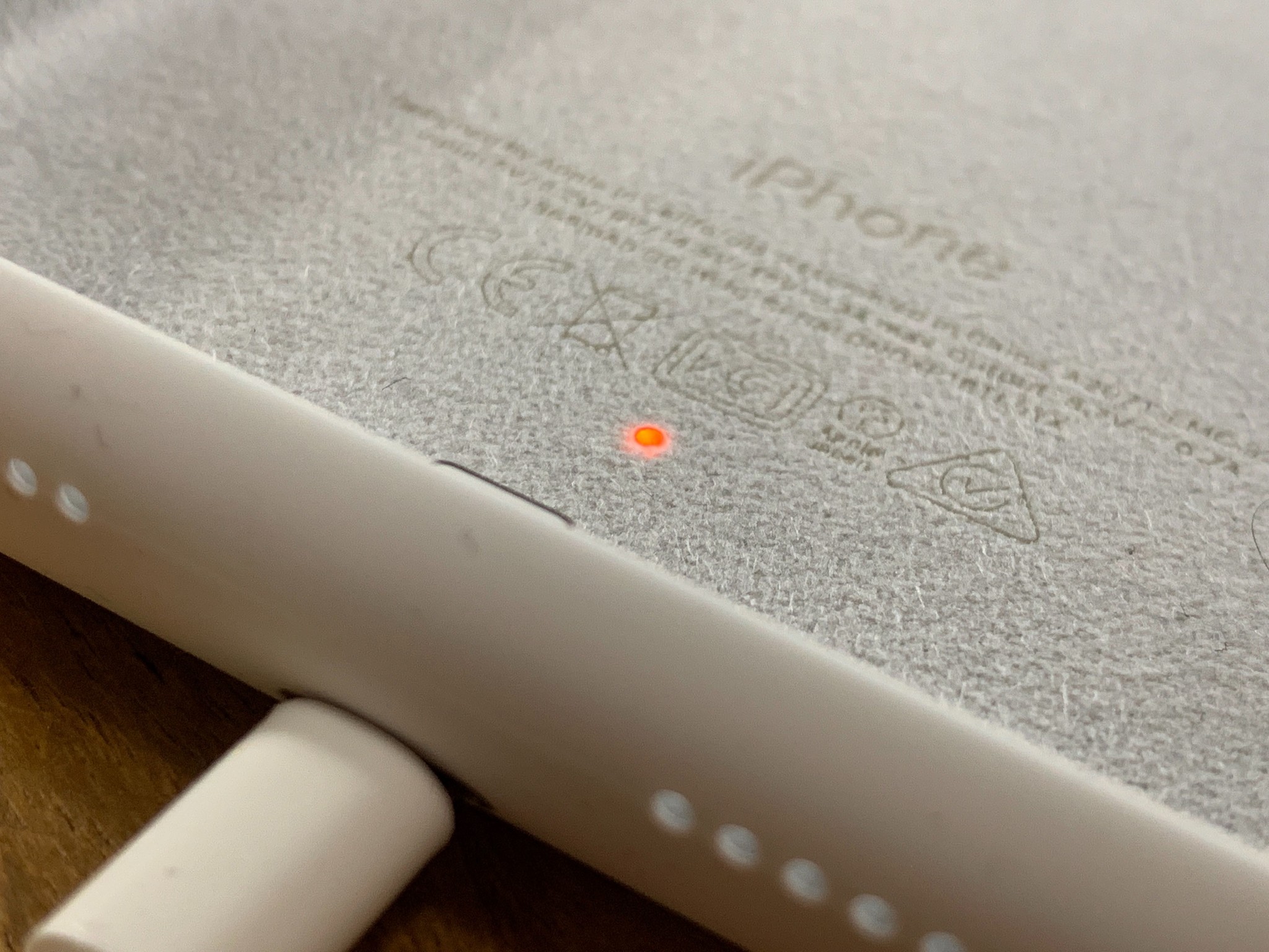 Close up of iPhone Smart Battery Case charging light