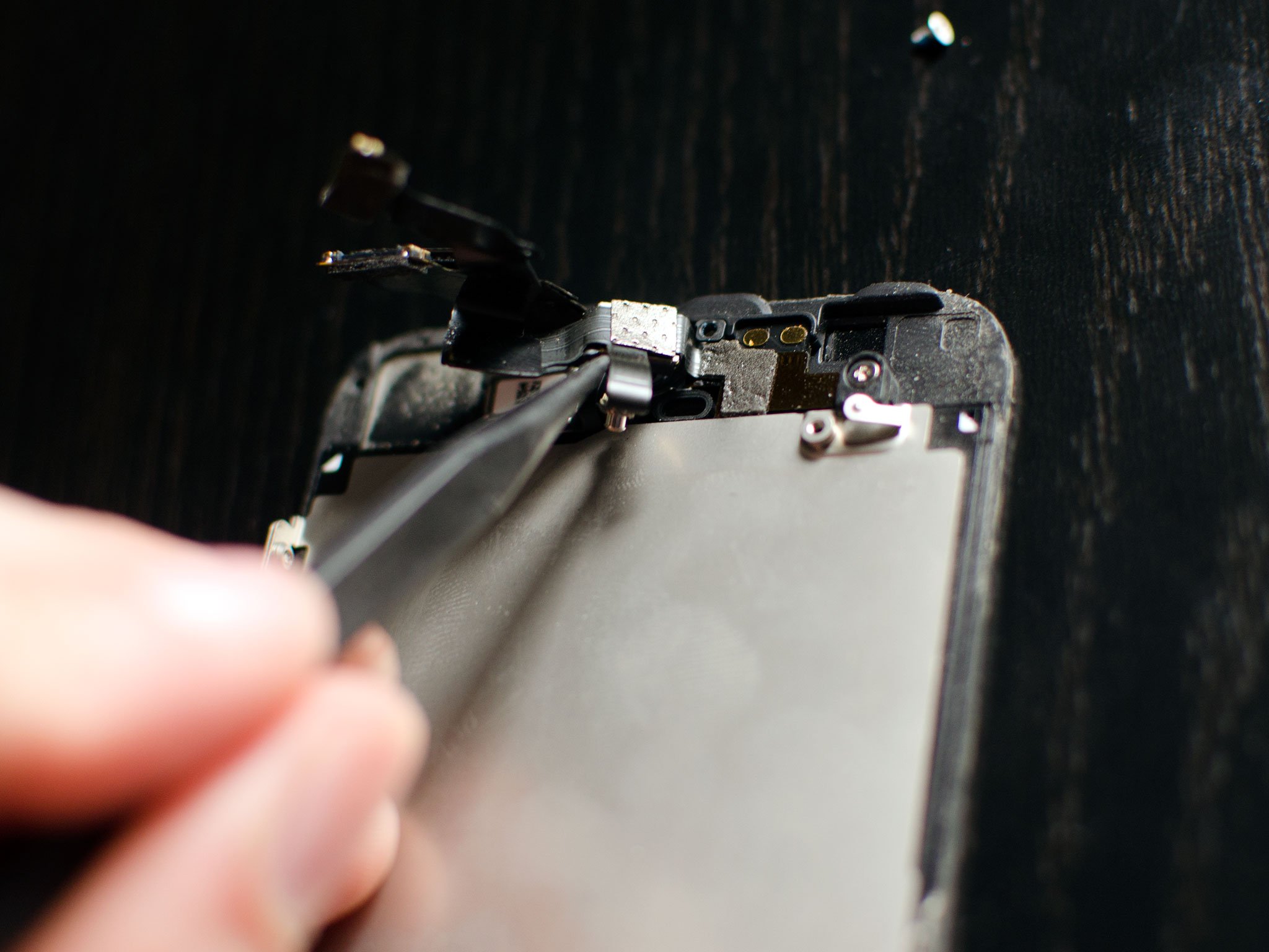How to DIY replace the front-facing FaceTime camera and sensor cable on the iPhone 5