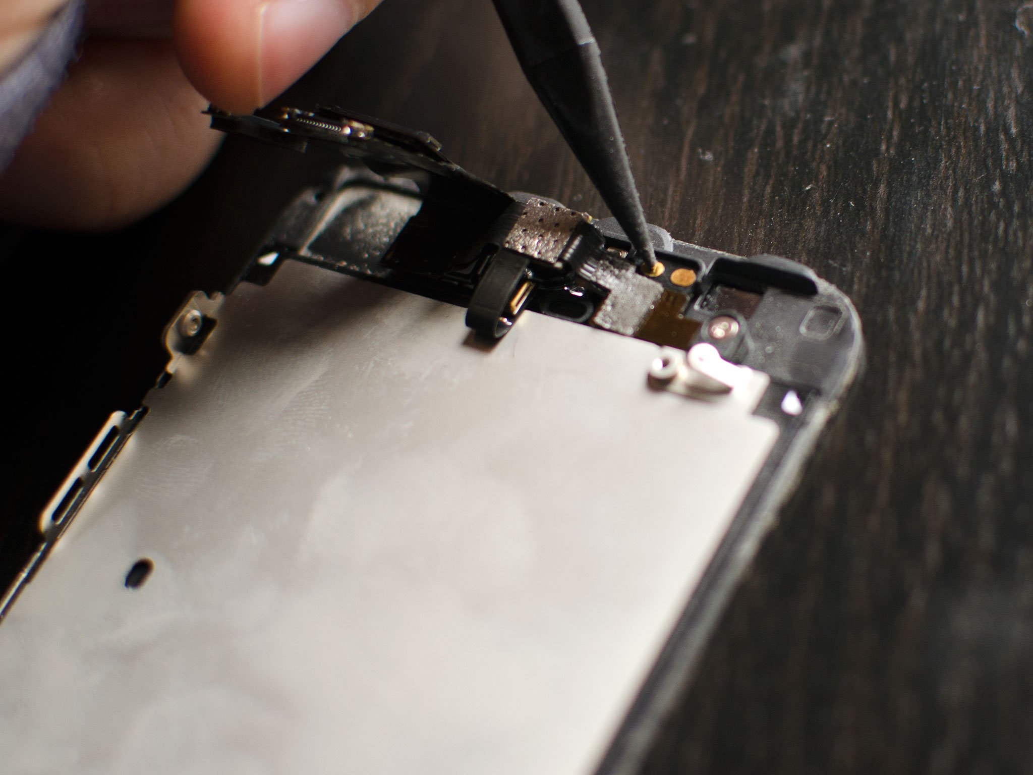 How to DIY replace the front-facing FaceTime camera and sensor cable on the iPhone 5